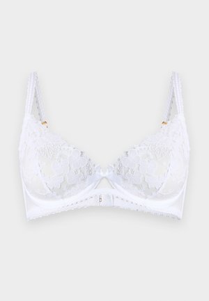 White lace bra with floral embroidery, adjustable double shoulder straps, central satin bow, and underwire support.