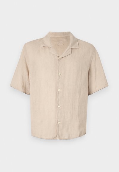 Μπεζ λινο πουκάμισο κοντό μανίκι με κολάρο τύπου notch και κουμπιές μπροστά. Μαλακή υφή με χαλαρό σχέδιο.