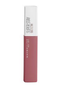 Maybelline Super Stay Matte Ink flytande läppstift i en rektangulär förpackning. Mjuk rosa färg, slät matt yta, vit kork och djärv branding.