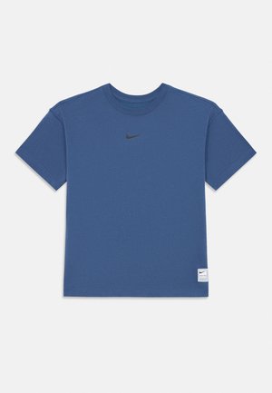 Blue short-sleeve Nike t-shirt with black swoosh logo centered below neckline and small white label near bottom hem on left side.