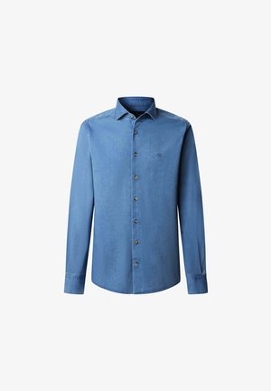 Chemise à manches longues, boutonnée, en denim bleu clair. Présente un col classique, sept boutons marron et un petit logo brodé sur la poitrine.