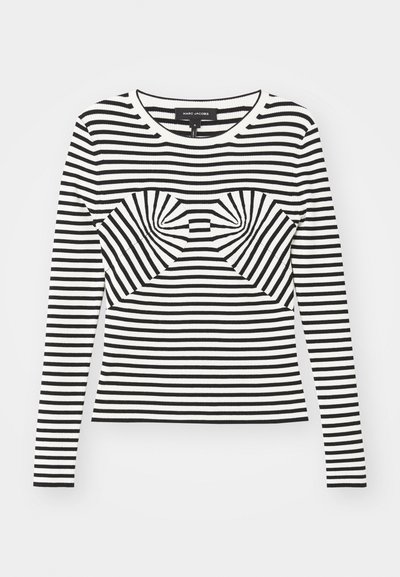 Black and white striped long-sleeve top with a ribbed texture and a bow-like design at the center front. Round neckline, fitted silhouette.