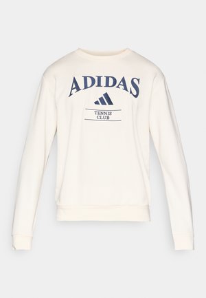 Felpa color crema con maniche lunghe, caratterizzata da un logo "ADIDAS" blu navy e dalla scritta "TENNIS CLUB". Polsini e orlo a costine completano il design.