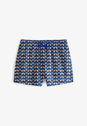 Bañadores en azul marino con un patrón repetido de abanicos en crema y rojo. Diseñados con una cinturilla elástica y un cordón azul.