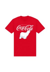 Rød bomulds T-shirt med et hvidt isbjørne-grafik under teksten "ENJOY COCA-COLA" i stiliseret hvid skrift.