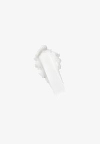 Produit cosmétique crémeux blanc appliqué sur une surface lisse, mettant en valeur une texture brillante avec un léger éclat et des bords arrondis.