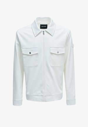 Weißes Langarmjacke mit Frontreißverschluss, zwei Brustklappentaschen mit Druckknöpfen und einem spitzen Kragen, innen am Kragen mit der Aufschrift "SALSA JEANS".