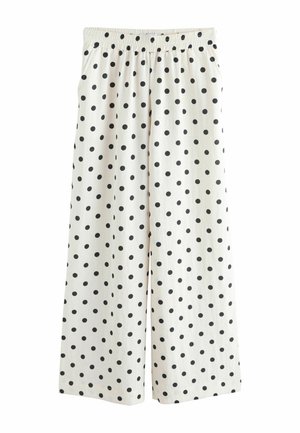 White wide-leg pants with black polka dots and an elastic waistband, displayed against a plain white background.