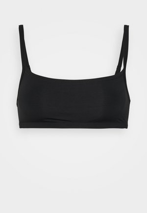 Zwarte bralette met een strak ontwerp, dunne verstelbare bandjes en een gladde stofstructuur; zonder padding, eenvoudige elastische band langs de onderkant.