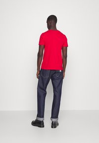 Tommy Hilfiger TOMMY LOGO TEE - T-shirt estampada - blazer red