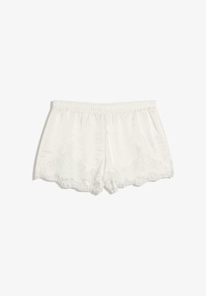 Biele saténové šortky s elastickým pásom a čipkovaným lemom pozdĺž okraja, navrhnuté pre pohodlie a štýl.