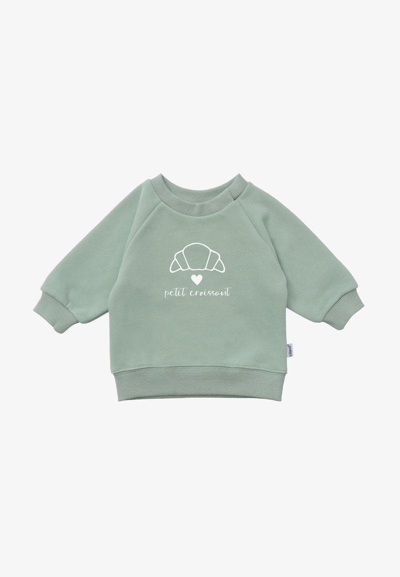 Green sweatshirt with raglan sleeves, featuring a white croissant graphic and text reading "petit croissant." Made from soft fabric.