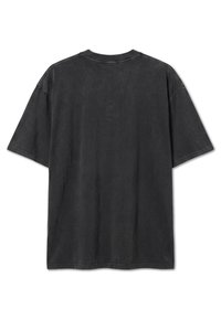 Black oversized short-sleeve T-shirt shown from the back with visible stitching on collar, sleeves, and hem.