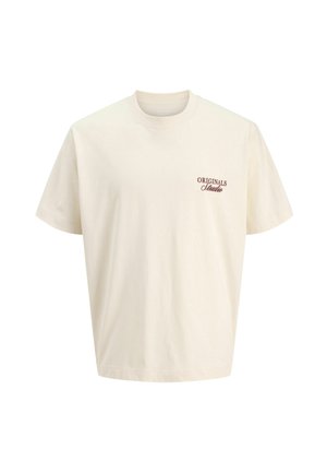 Cream-colored cotton t-shirt with short sleeves, crew neck, and a small brown "ORIGINALS" logo on the left chest.