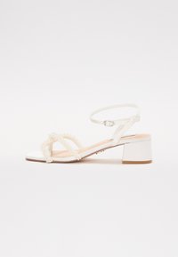 Επιλέχθηκε, ivory satin