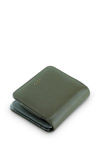 Green leather wallet with a smooth texture, folded design, gold branding "VUCH," and a zippered compartment along the edge.