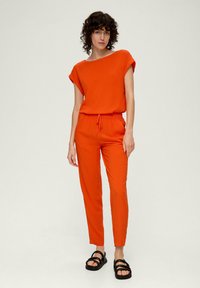 s.Oliver Tracksuit bottoms - dunkelorange