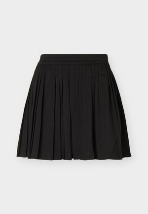 Jupe plissée noire avec taille élastique, longueur genou, en tissu léger, présentée sur un fond blanc uni.