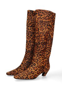 Leopard print knee-high boots made of hair-like material, featuring a pointed toe, low heel, and rich orange and black colors with soft texture.