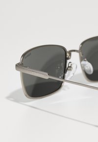 Polaroid UNISEX - Aurinkolasit - matte black