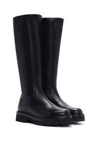 Black leather knee-high boots with a smooth texture, rounded toe, and thick rubber sole featuring a rugged tread pattern.