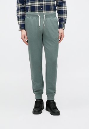 - Spodnie treningowe