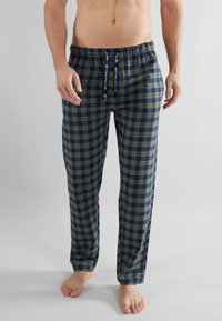 Pantalons de pyjama à carreaux navy et vert avec une taille élastique et un cordon de serrage. Fabriqués en tissu doux, offrant une coupe décontractée et des jambes longues.