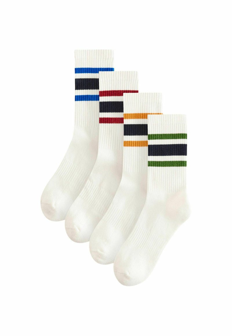 Neljas valge sokkide komplekt ribakudumisega tekstuuriga, millest igaühel on vertikaalselt lähedal üleval värvilised triibud: sinine, punane, oranž ja roheline.