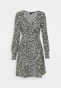 Svart klänning med vitt prickigt mönster, V-ringning, långa puffärmar och veckade muddar. Kjoldesign med utsvängd silhuett. Lätt tygstruktur.