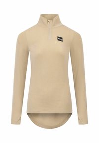 Haut zippé beige à manches longues avec une texture côtelée, un col montant et un ourlet incurvé. Présente une étiquette noire sur la poitrine.