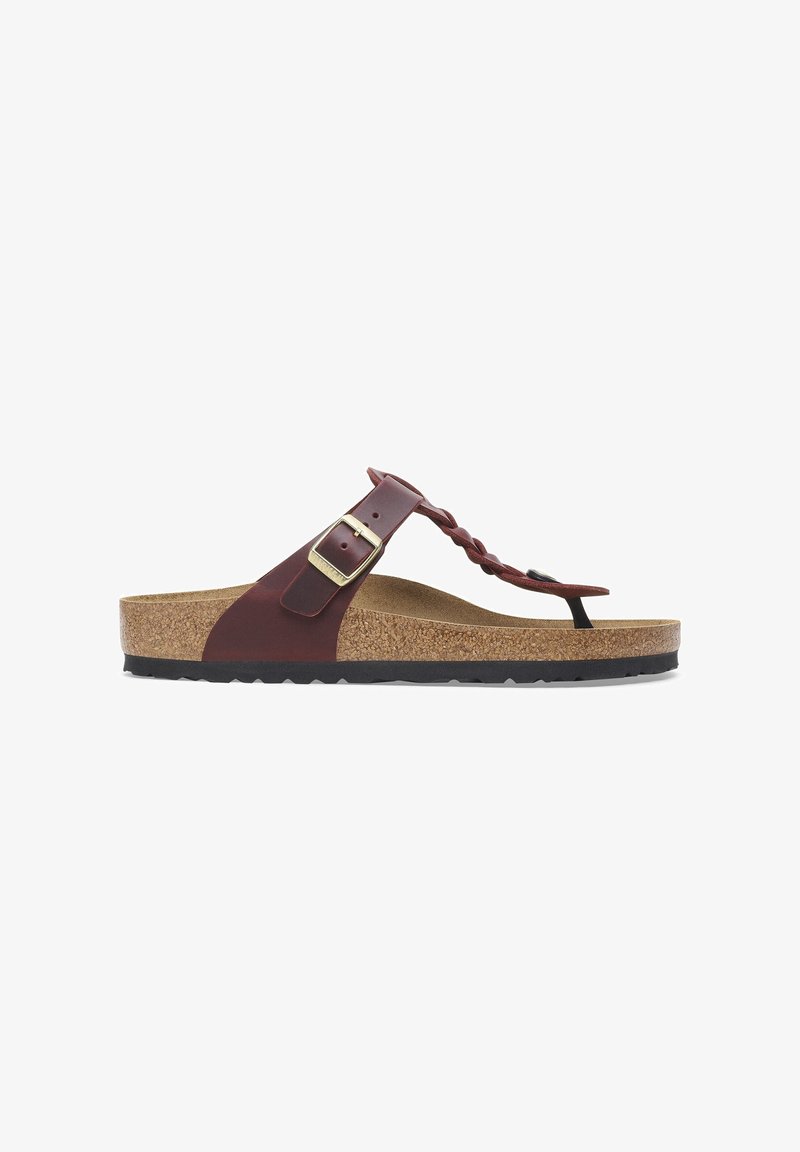 Sandal in pelle marrone con cinturino intrecciato, fibbia regolabile, soletta in sughero e suola in gomma nera. Design semplice e casual.