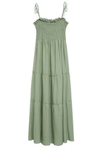 Robe longue verte avec corsage smocké, bretelles spaghetti ajustables et design à volants. Tissu doux et léger avec une texture lisse.