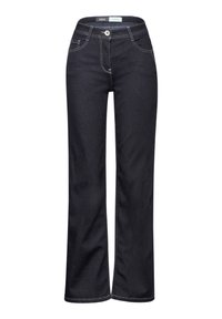 Jeans de mezclilla azul oscuro de pierna ancha con cierre de botón y cremallera, que presentan detalles de costura en contraste y cinco bolsillos.