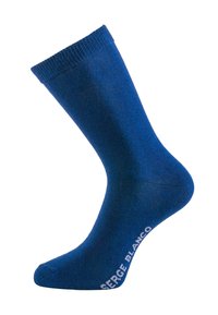 Chaussette bleue mi-mollet avec bord côtelé et texte "SERGE BLANCO" en blanc près de l'orteil sur fond blanc.