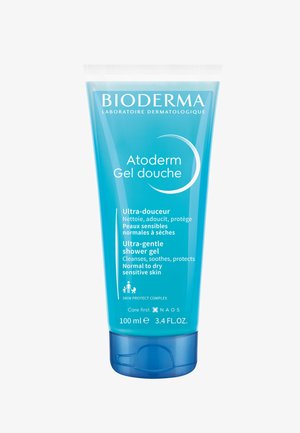 Bioderma Atoderm Duschgel in einer durchsichtigen türkisfarbenen Tube, ausgestattet mit einem Klappdeckel, enthält 100 ml ultra-sanftes Duschgel für empfindliche Haut.