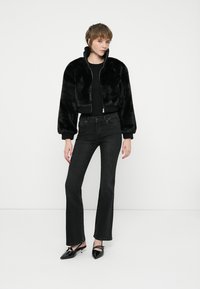 ONLY ONLBLUSH - Vaqueros a campana - black denim