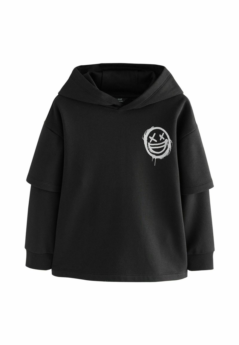 Black oversized hoodie made of cotton blend, featuring a large hood, short sleeves, and a white smiley face graphic on the front.