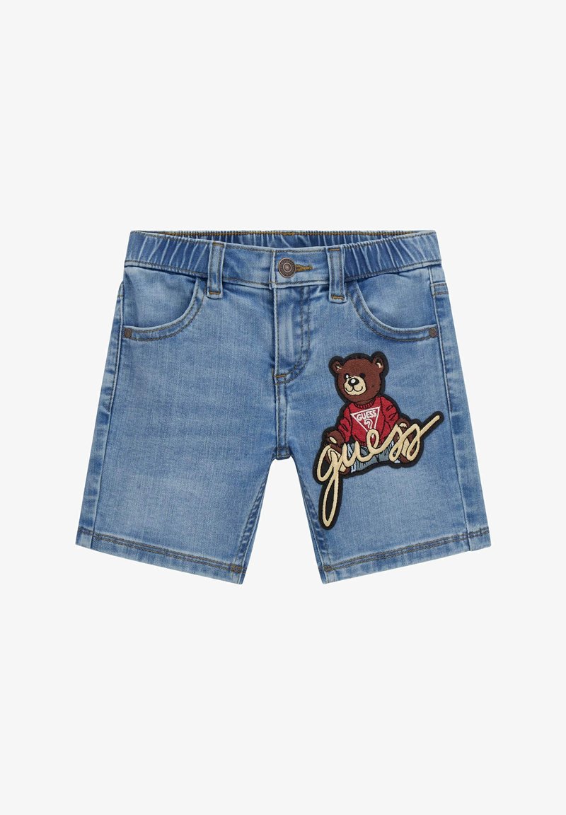 Denimshorts i en medelmörk tvätt med en björnpatch och "guess" brodyr fram. Standard femfickorsdesign, knäppning.