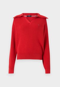 Red knitted sweater with a V-neck and oversized collar. Features long sleeves and ribbed hem. Small logo detail on the chest.