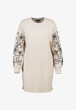 Robe beige à manches longues avec des motifs floraux brodés en noir sur les manches ; décolleté rond, coupe ample et poignet côtelé.