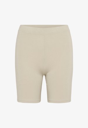 Beżowe elastyczne szorty wykonane z miękkiego materiału, charakteryzujące się dopasowanym krojem, elastycznym pasem i gładką, nieozdobioną powierzchnią.