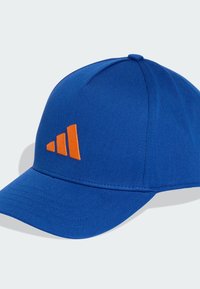 Blue baseball cap made of fabric, featuring a curved brim and an orange embroidered three-stripe logo on the side.