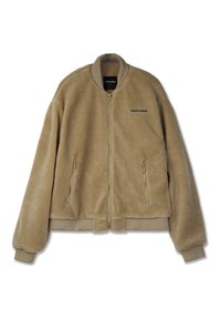 Jachetă bomber din fleece bej, cu fermoar frontal, mâneci și margine ribbate. Dispune de două buzunare laterale cu fermoar și inscripția "PEGADOR" pe piept.