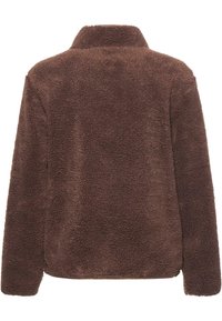 Giacca in pile marrone con una superficie morbida e testurizzata, dotata di colletto e maniche lunghe. Nessuna chiusura o motivo visibile.