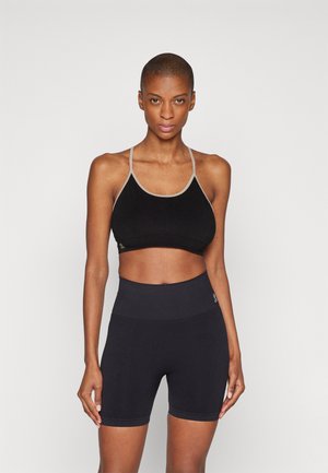 DHARMA SEAMLESS BRA - Sport-bh met light support - black
