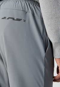 BOSS Tracksuit bottoms - dark beige