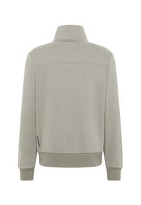 Hellgrauer Pullover mit hohem Kragen, gerippten Bündchen und Saum sowie einer glatten Textur. Verfügt über eine dezente Nahtdetail am Rücken.