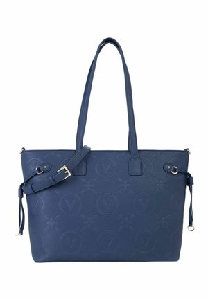 Sac cabas bleu marine en simili cuir texturé, avec un motif imprimé de logos en relief et deux anses offrant différentes options de port.