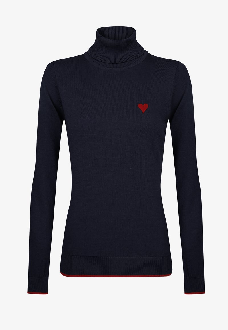 Tumesin turtleneck-sweater, mis on valmistatud siledast kudumist. Selles on väike punane südame tikand rinnal ja kontrastne punane äär.