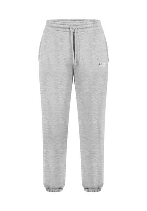 Grå sweatpants lavet af blødt stof med elastisk talje, smalle ben og manchetter. Har et lille logo på højre side.